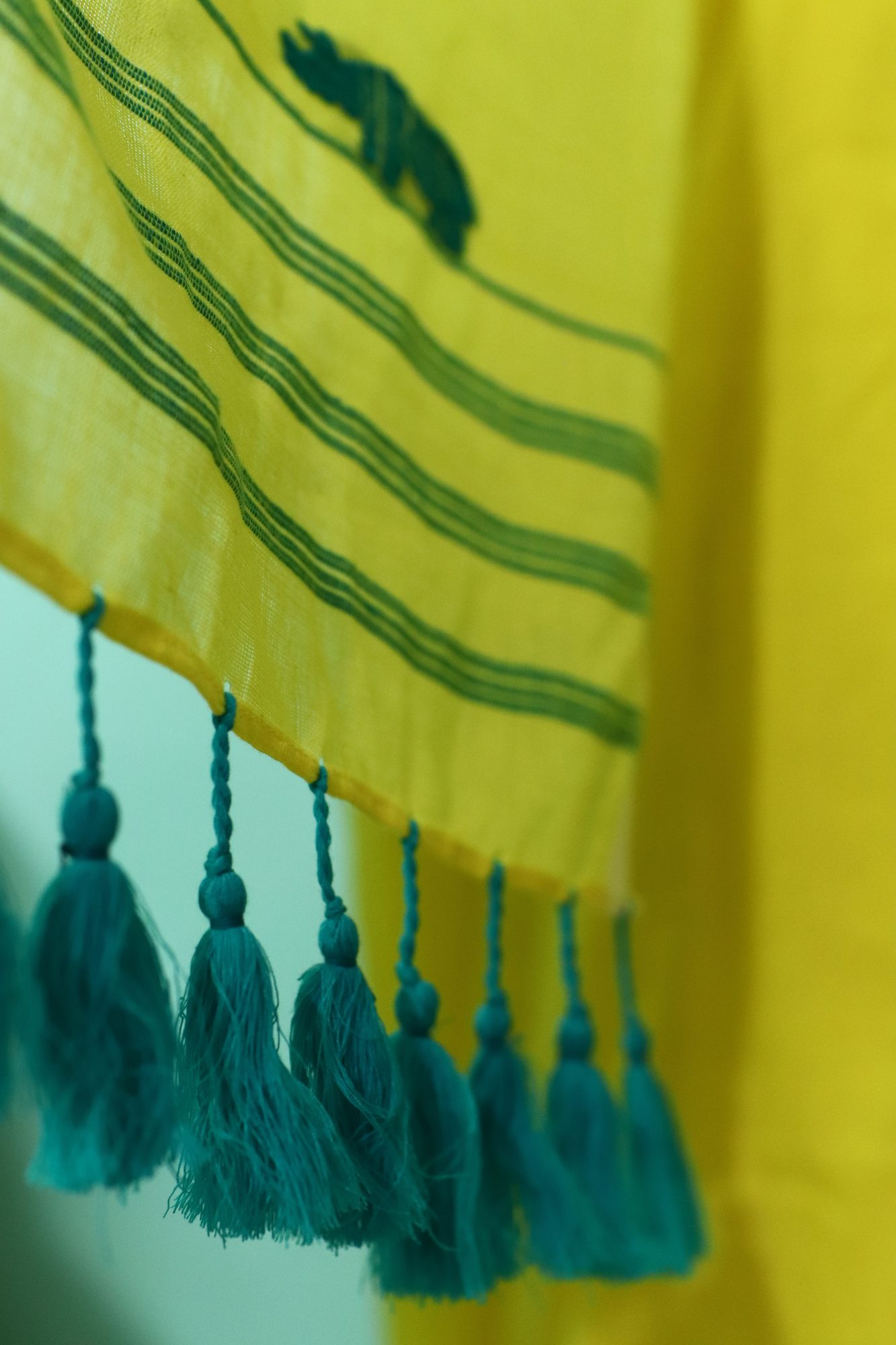 Lime Green Handwoven Saree with Rhino Motif