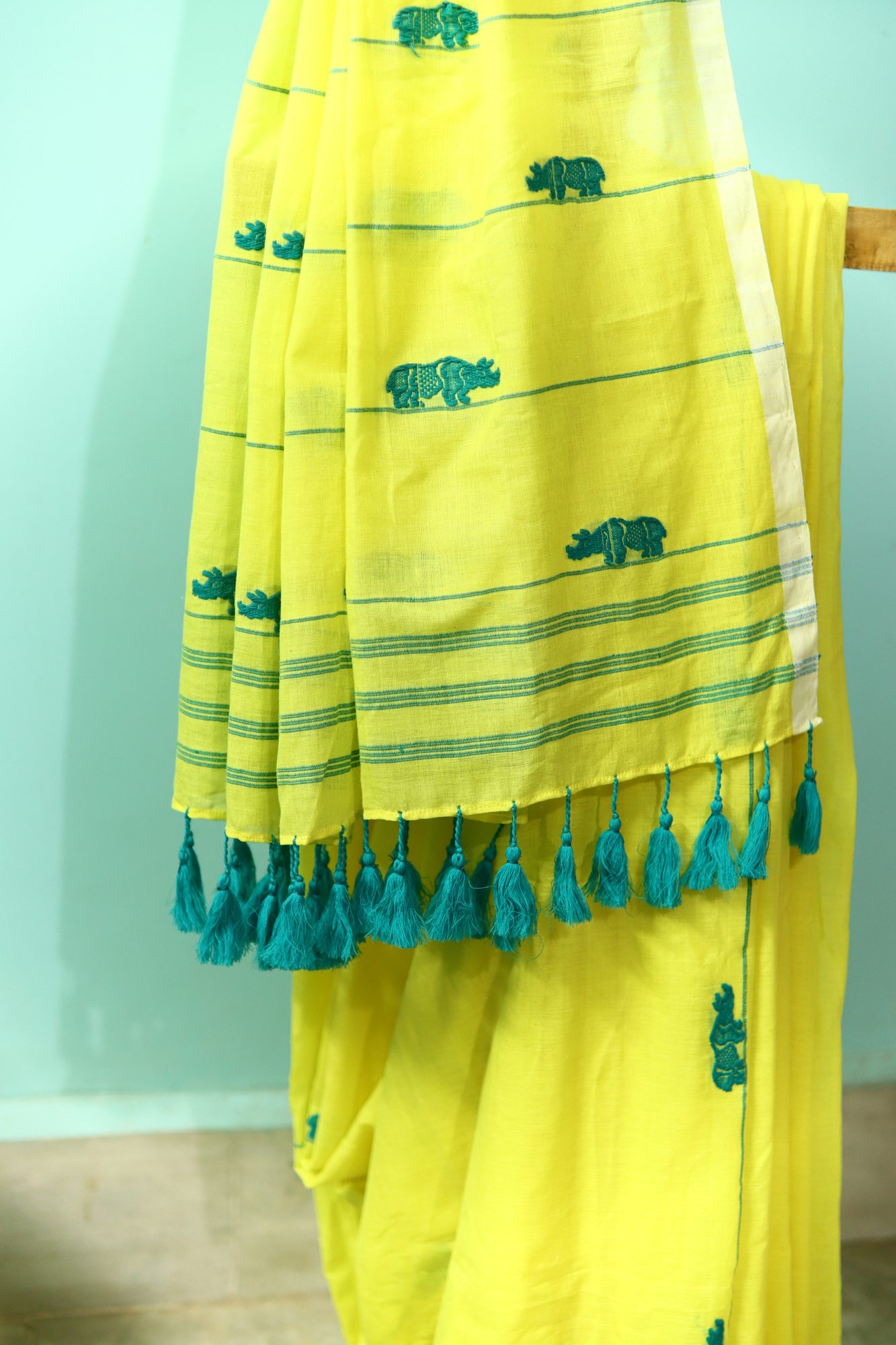 Lime Green Handwoven Saree with Rhino Motif