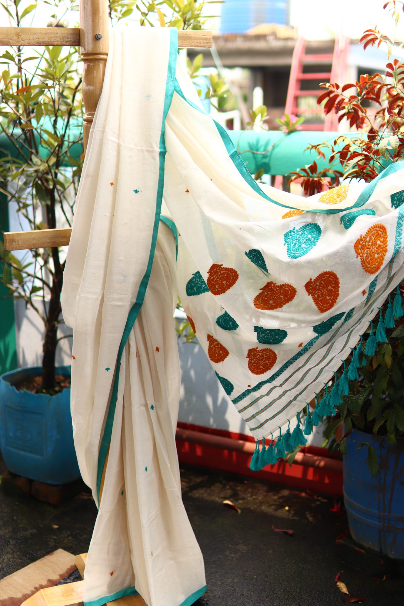 White Handwoven Saree with Blue & Yellow Kolka Buta