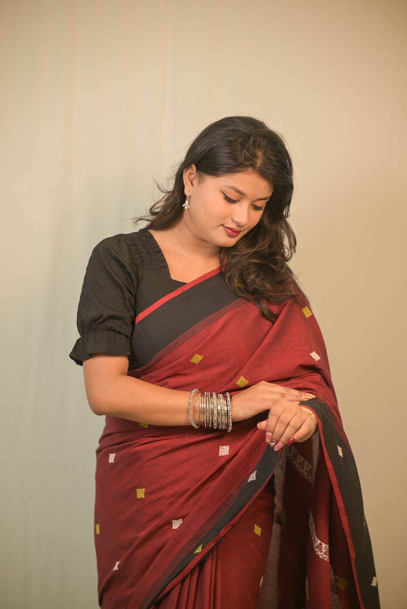 Maroon Handwoven Saree with Black Border