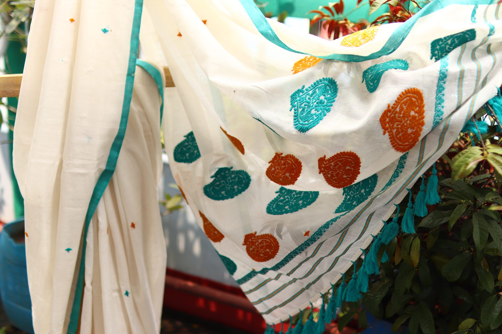 White Handwoven Saree with Blue & Yellow Kolka Buta